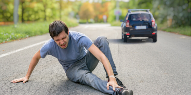 pedestrian injured on the street after hit and run accident